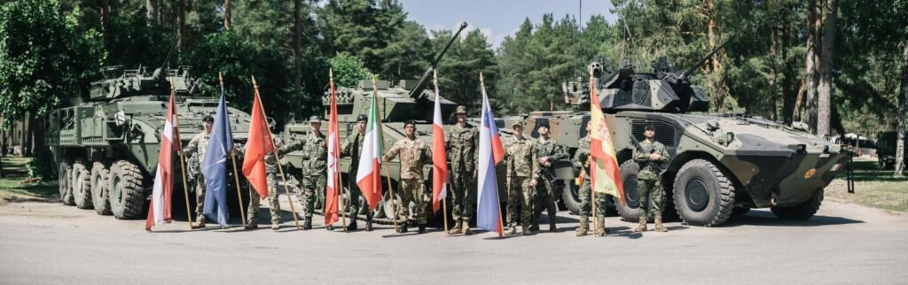 A photo depicting the welcoming ceremony for NATO Multinational Battlegroup Latvia in 2017. 